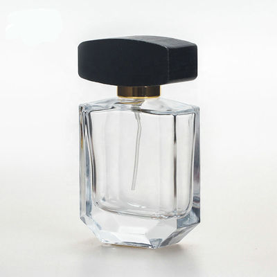 Garrafa de perfume de vidro vazia com o tampão preto de madeira do collarwith do pulverizador do tampão e da bomba