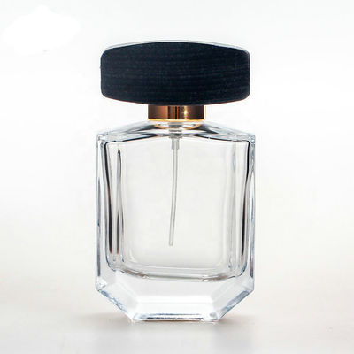 Garrafa de perfume de vidro vazia com o tampão preto de madeira do collarwith do pulverizador do tampão e da bomba