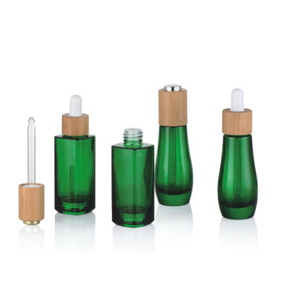 Garrafa de óleo essencial de vidro com a garrafa de óleo pequena do conta-gotas resistente de bambu da criança