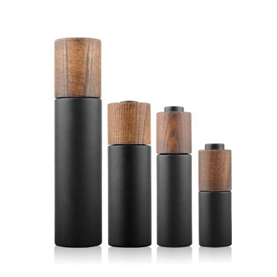 Tampão de bambu de madeira desenvolvido novo em volta de Violet Glass Bottle escura com bomba da loção